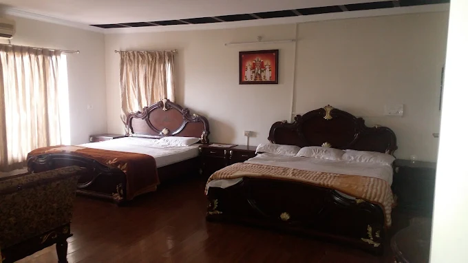 Executive Family Suite sitting space and bedroom area